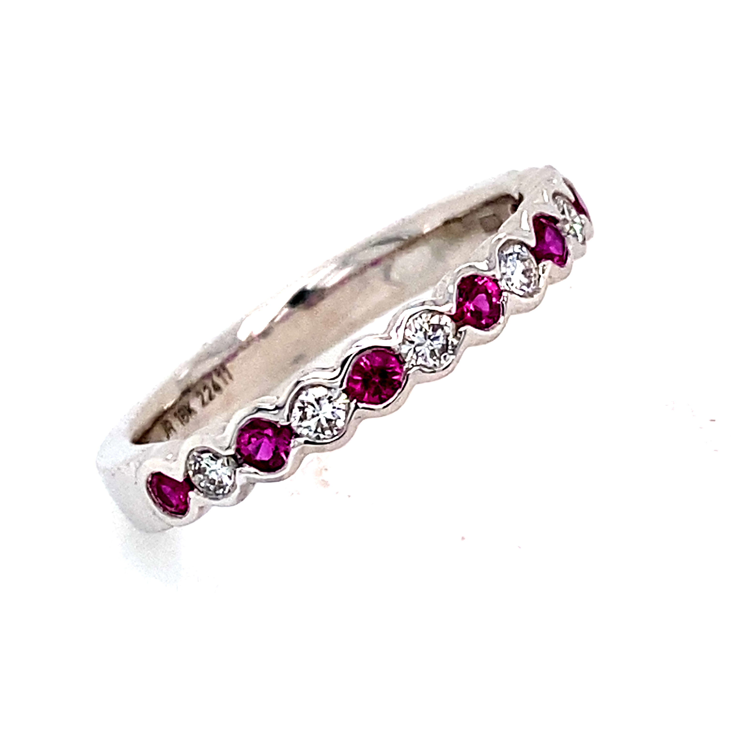 Ruby and Diamond 1/2 Eternity style ring.
